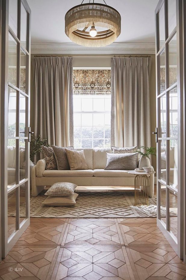 From the Luxoria collection by ILIV, the Roman Blind in Cabaret, perfectly complements the neutral colour palette and adds a touch of regality.