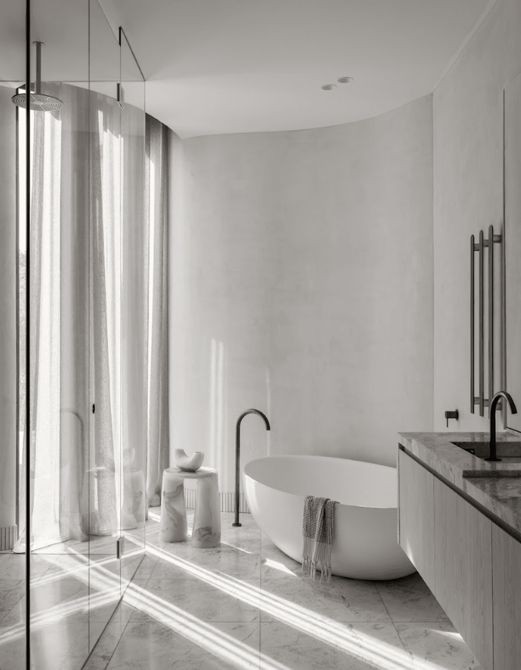 Opulent materials that are both striking and balanced in the way they sit in various rooms are featured in the space.