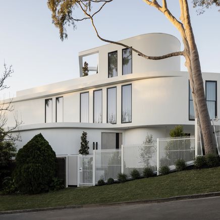 A house of unique curves, lights and shadows in upmarket Toorak