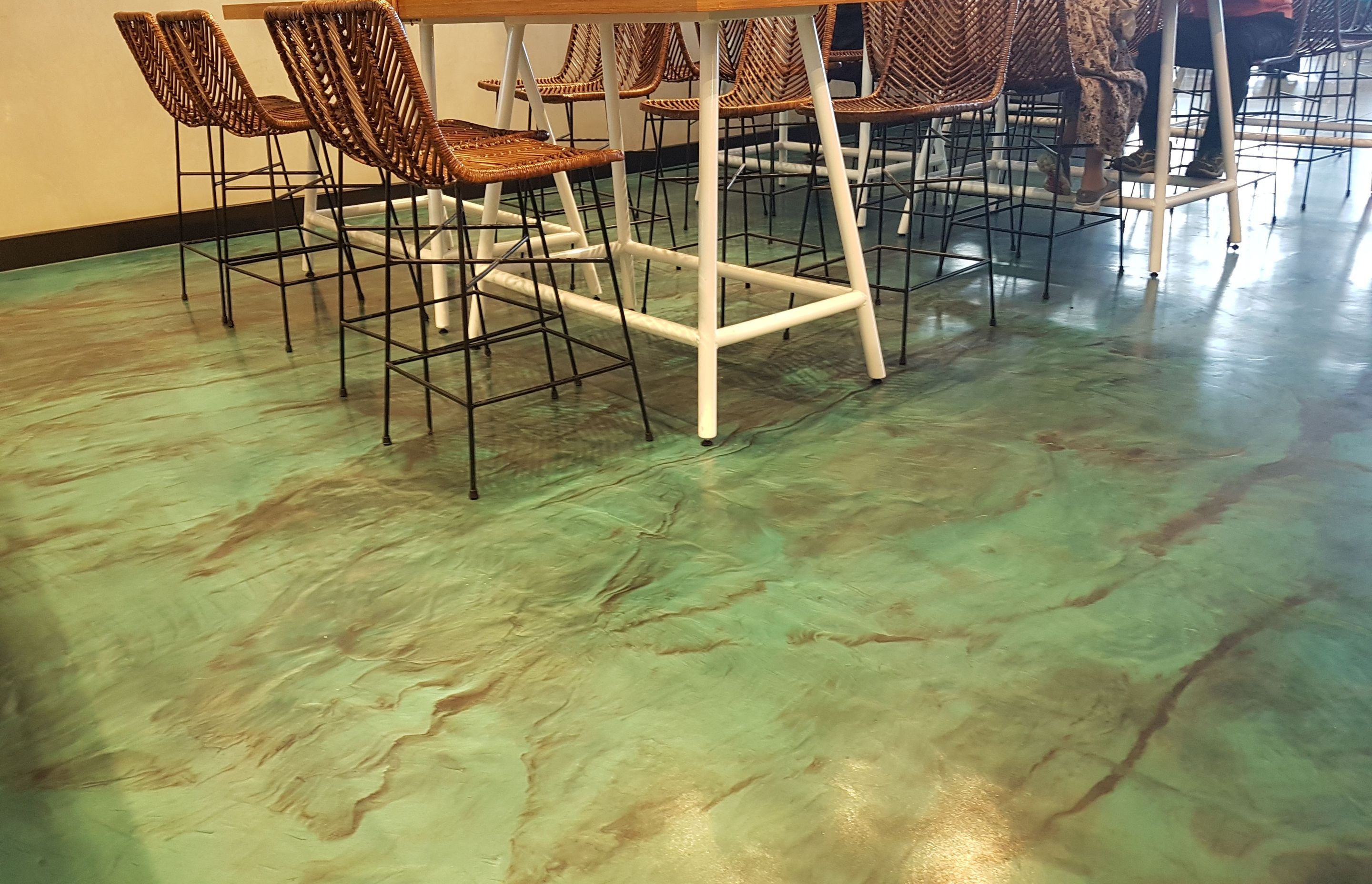The Micro-colour finish was teamed with a metallic epoxy floor coating to create a truly unique interior.