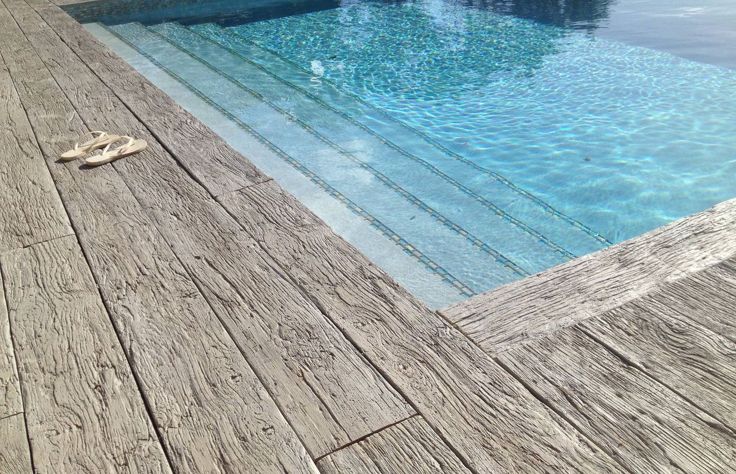 Weathered Oak Driftwood infinity edge pool Caribbean Islands