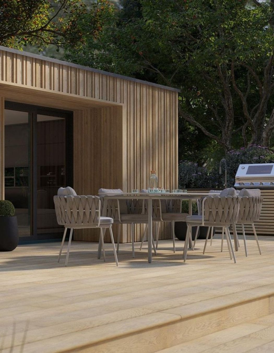 Envello board &amp; batten cladding in golden oak by Millboard Decking