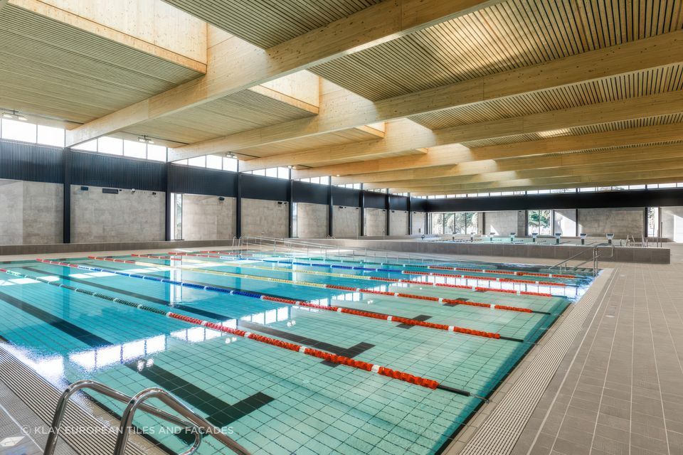 Northcote Aquatic Recreation Centre: Architect Warren &amp; Mahoney chose Agrob Buchtal Hytect tiles throughout the facility including Area Pro series on the pool hall concourse.