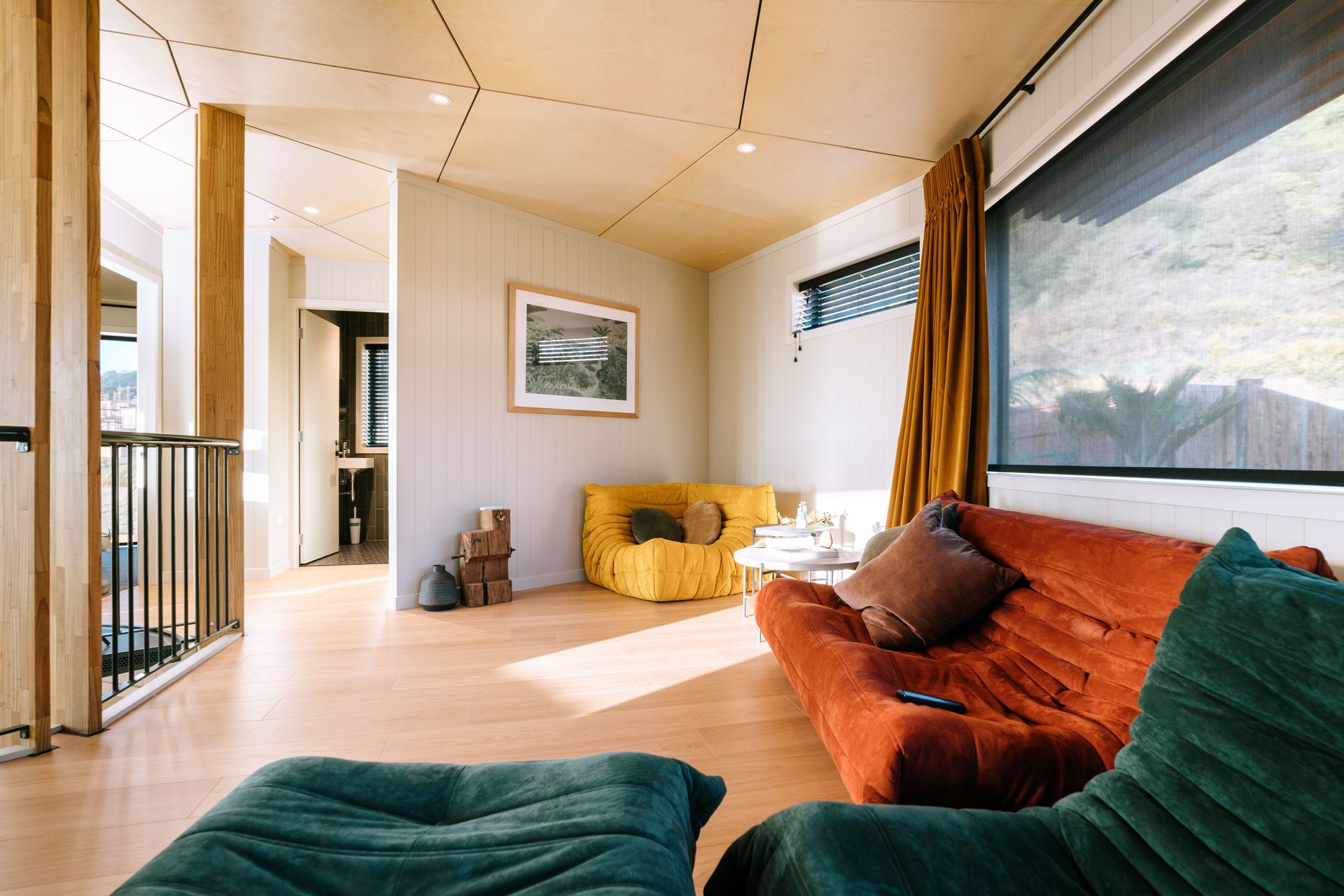 The upstairs lounge that doubles as a pathway.