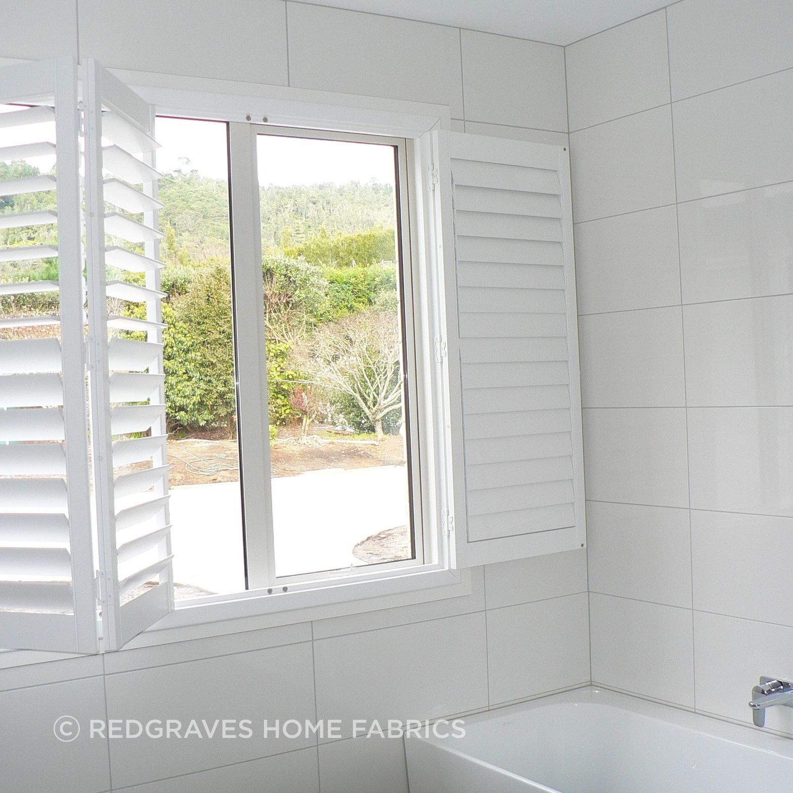bi-fold shutter in bathroom