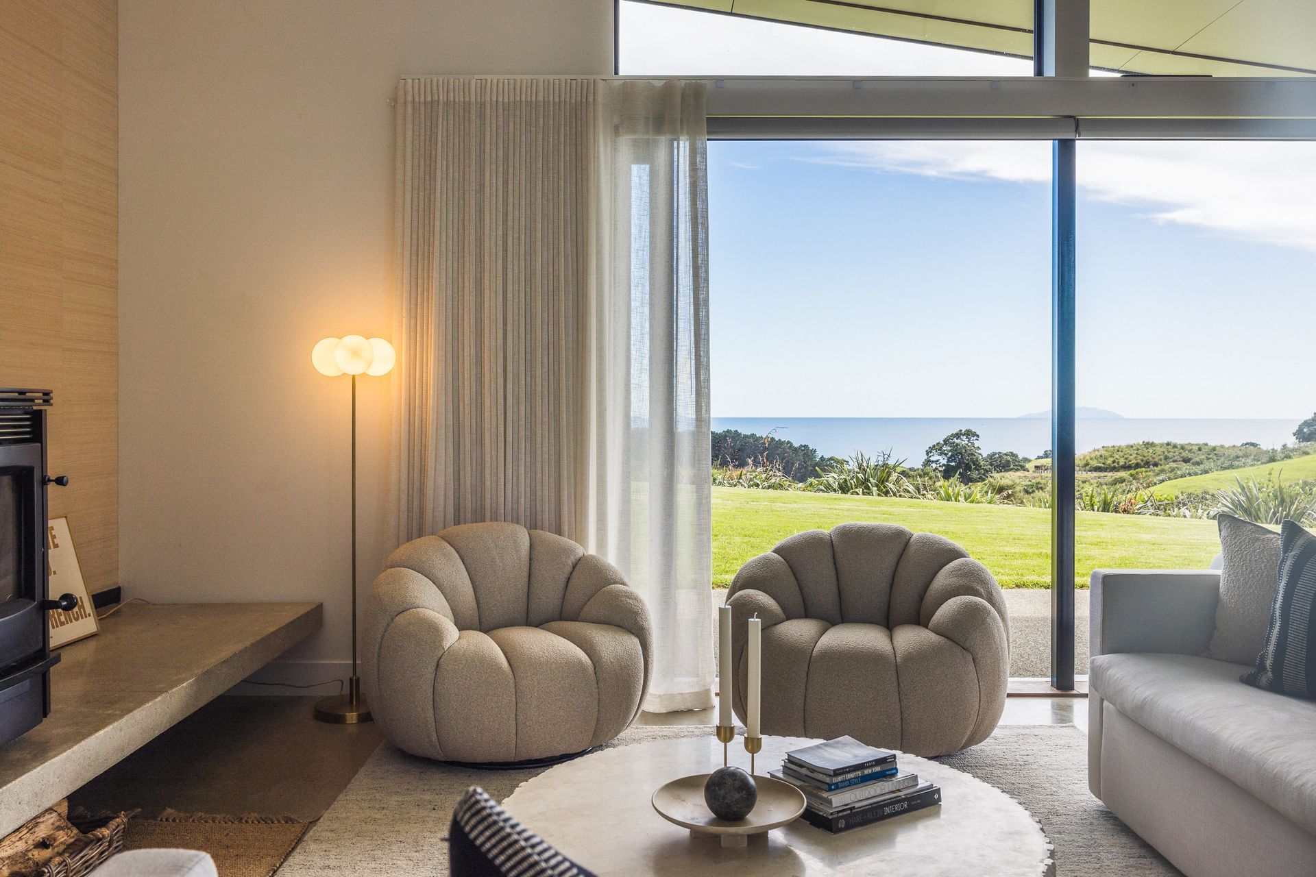 This newly built home in Waiheke's Palm Beach didn't reflect the owner's personal style when they purchased the property, so they engaged Island Interiors to create a space fit for relaxing with family and entertaining friends.