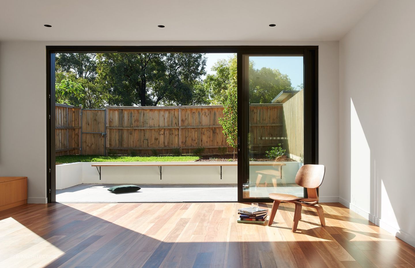 The living space in this home is well placed to capture sunlight. Photography by Veeral.