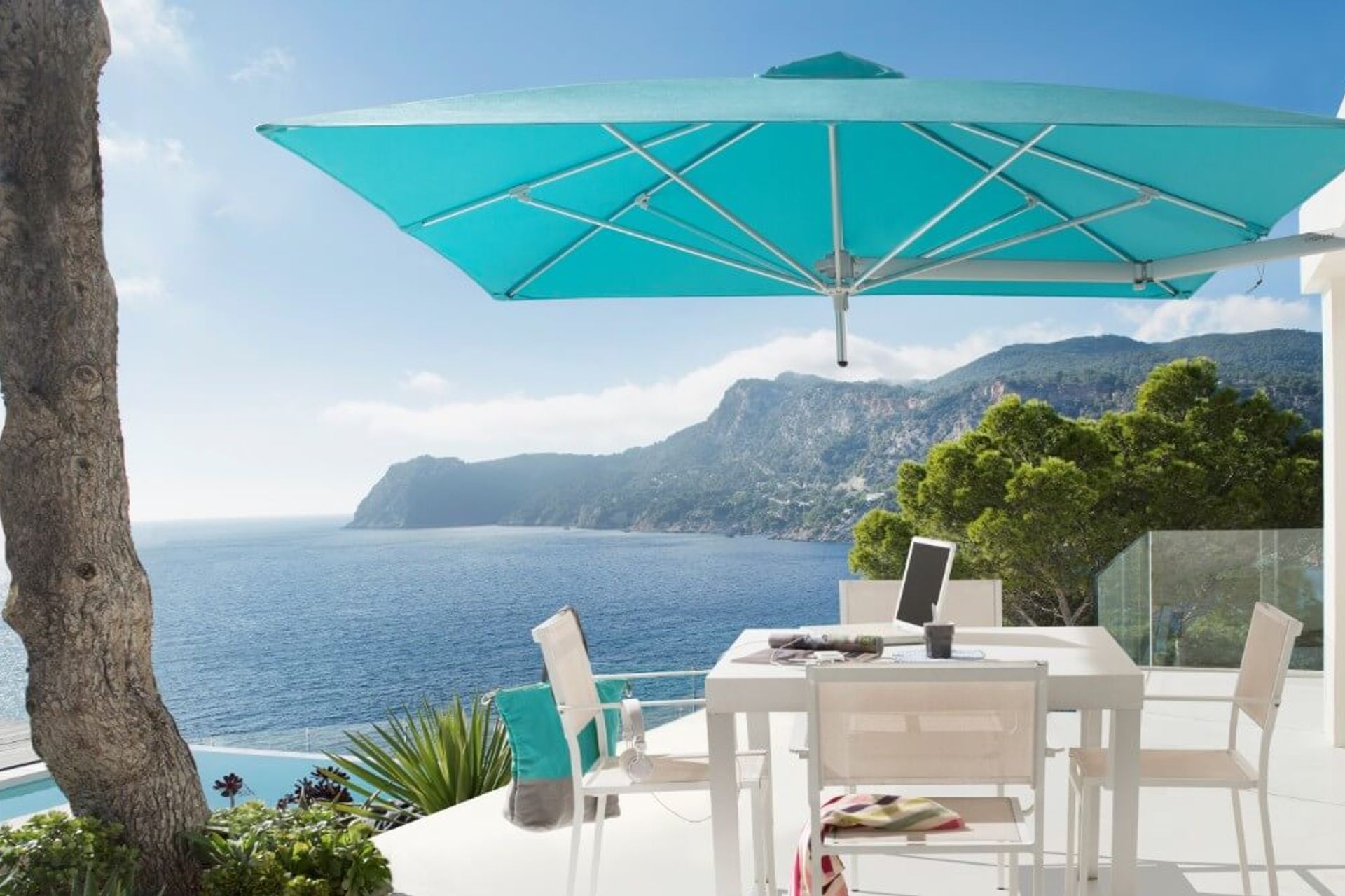The wall-mounted Paraflex square umbrella is an ideal solution for outdoor areas with limited floor space.