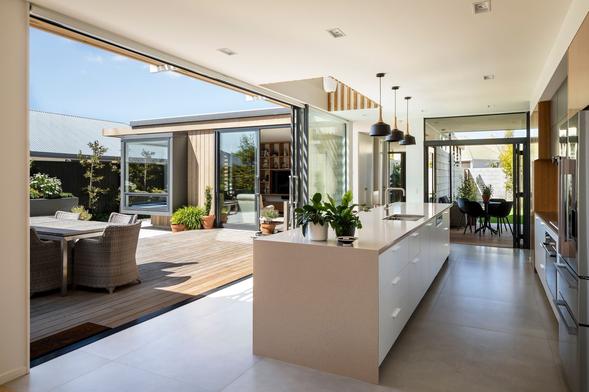Pivot House. A view of the kitchen looking out to the main courtyard.