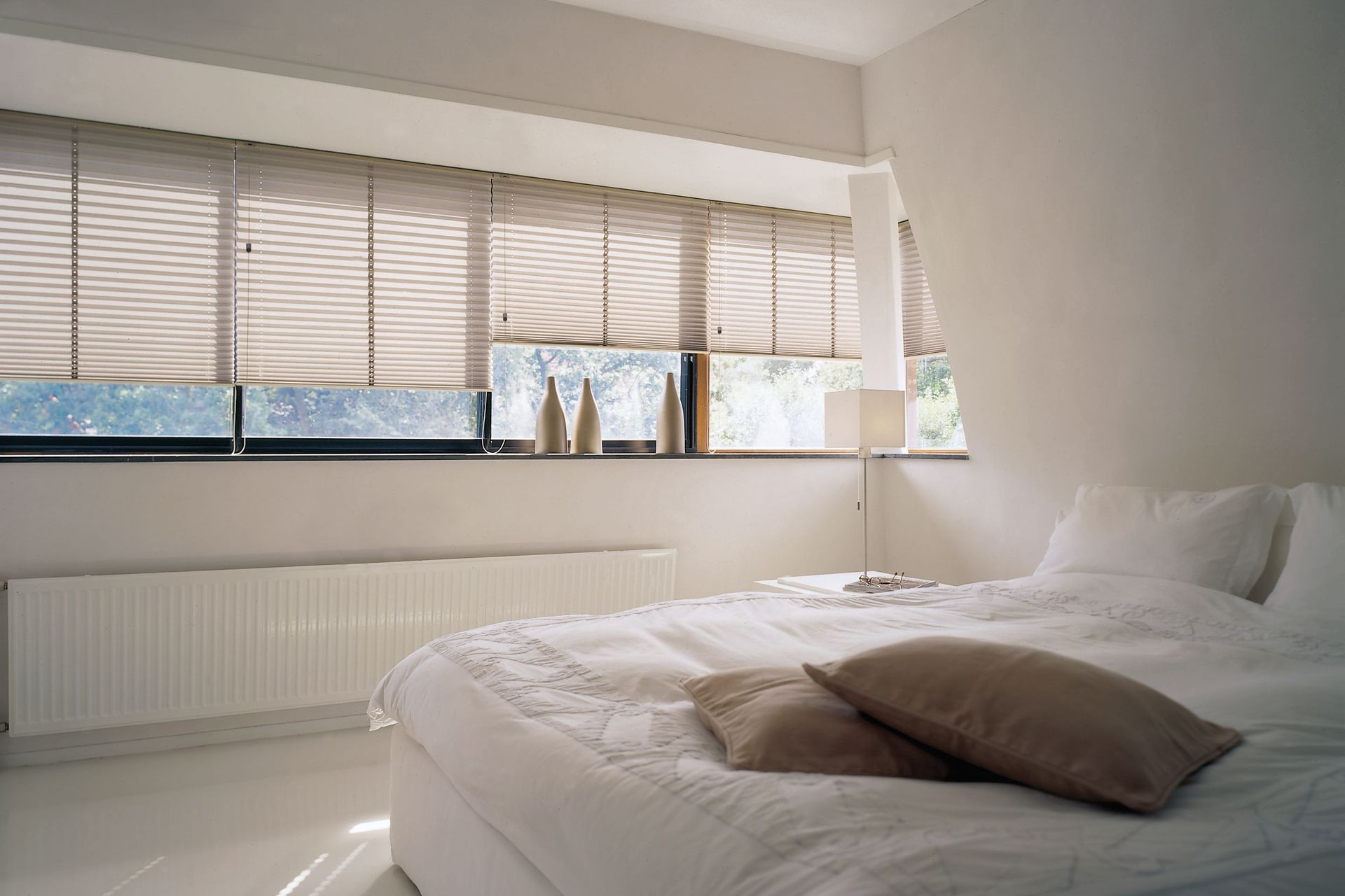 Smart window shades allow you to adjust light and privacy at the touch of a button.