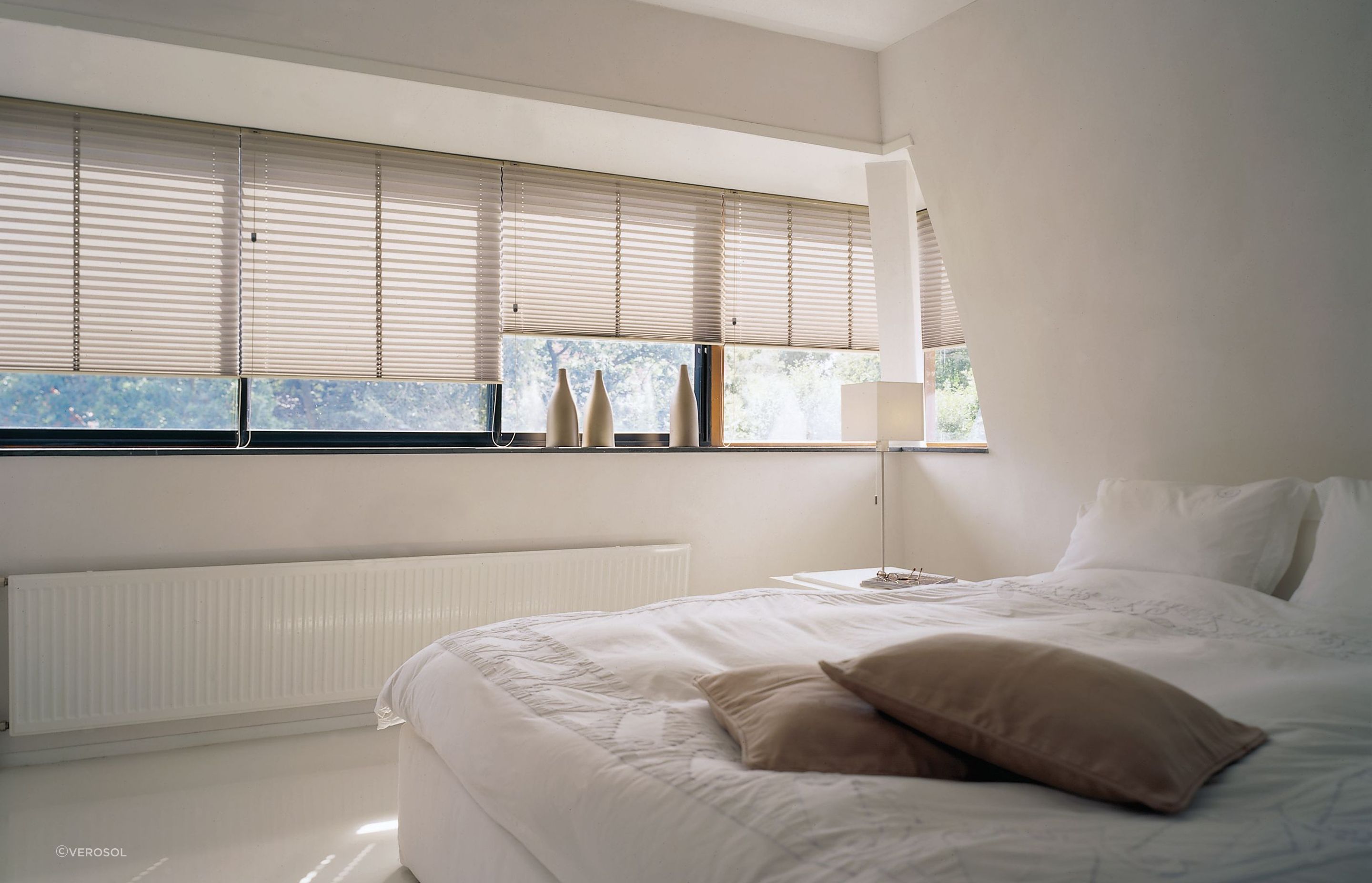 Smart window shades allow you to adjust light and privacy at the touch of a button.
