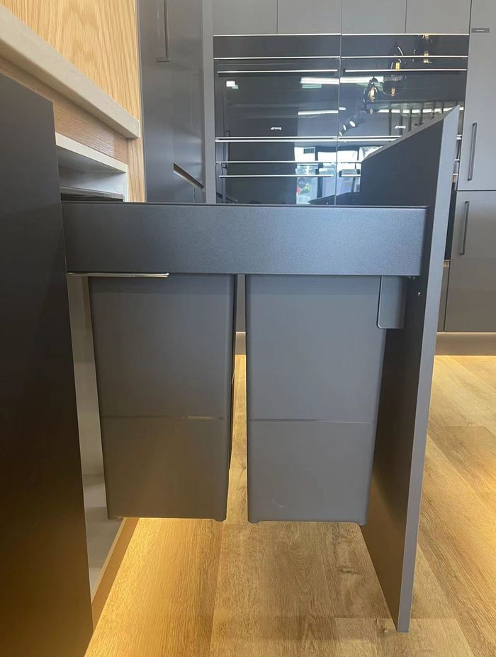 2 Full sized bins that can be pulled out from the cabinets in our Kitchen showroom in Auckland