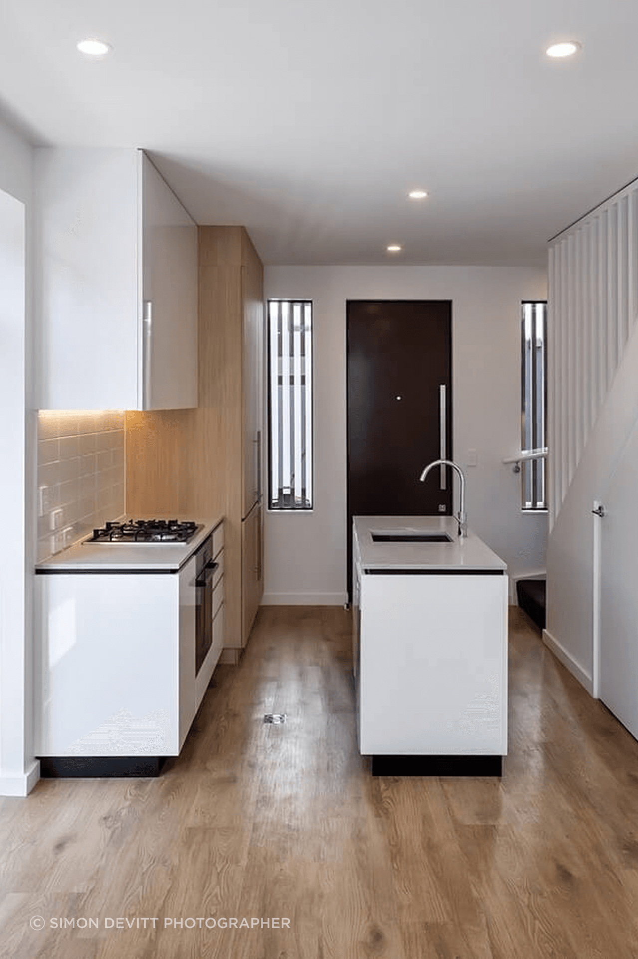 Small apartment kitchen featuring PureCoat™ panel cabinetry