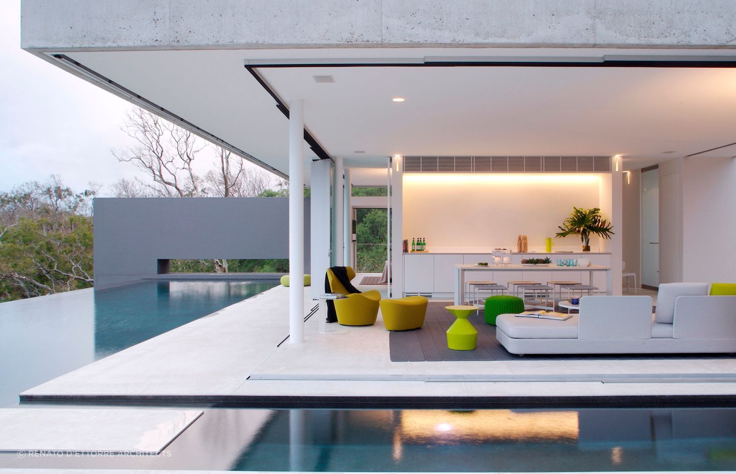 Azuris, Hamilton Island by Renato D'Ettorre Architects | Photography by Francesca Giovanelli - colourful furniture and an open plan design can give your backyard or pool area a relaxed feel.