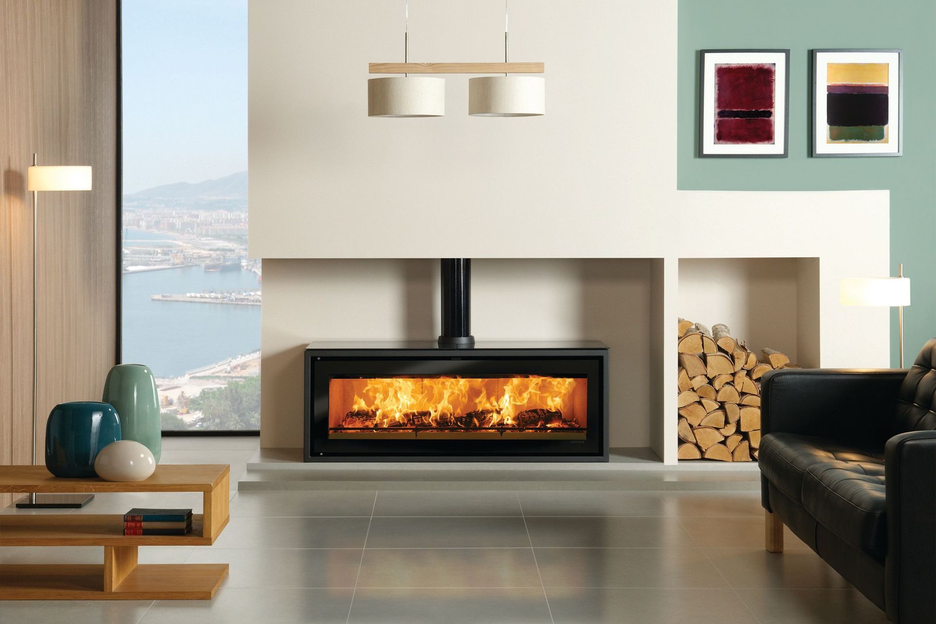 With its panoramic viewing window and tilt-down door to minimise ash fall beyond the hearth, The Stovax Studio 3 is available as a free-standing (pictured) or built-in model.
