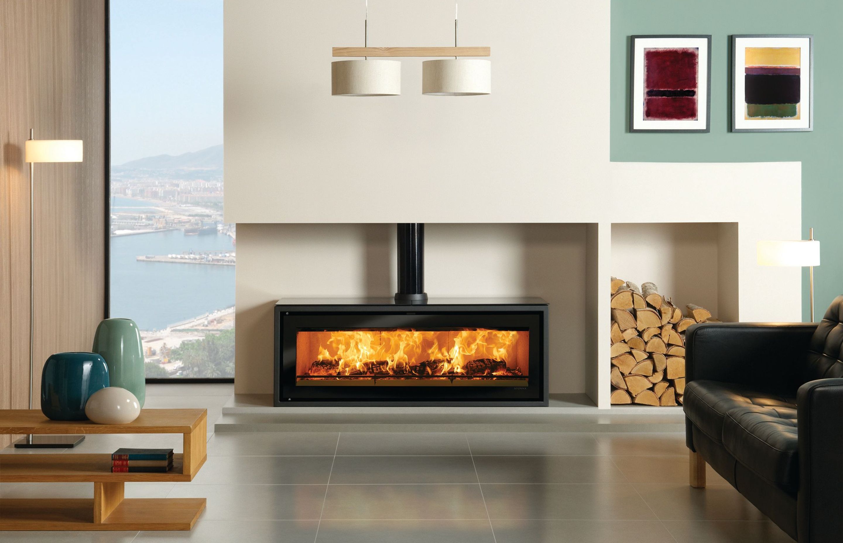 With its panoramic viewing window and tilt-down door to minimise ash fall beyond the hearth, The Stovax Studio 3 is available as a free-standing (pictured) or built-in model.