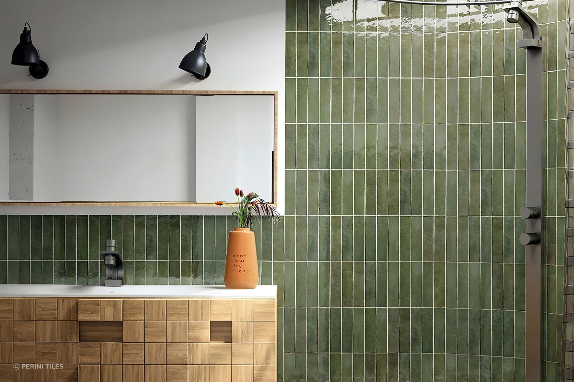 Choosing a grout that will contrast your tile’s colour creates a striking look that emphasises the tile’s shape and layout pattern. This style is an excellent choice for creating dramatic and eye catching feature walls in the home. Our luscious Riverside wall tiles are pictured in this bathroom design, paired with a contrasting white grout that outlines their sleek shape.