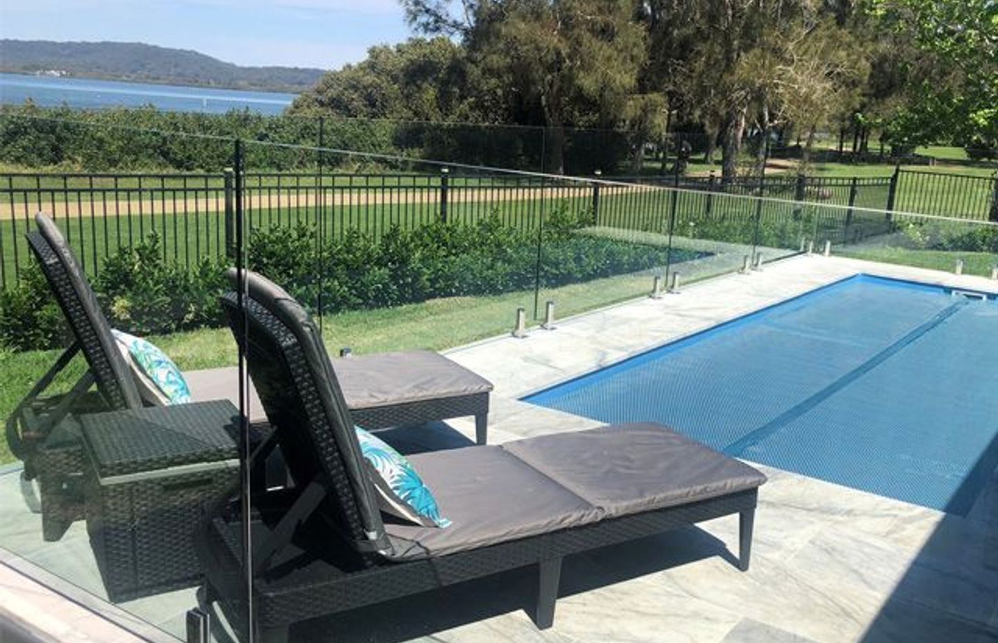 RIVERSIDE RETREAT | POOL COVER SYSTEM CONCEALED UNDER MARBLE TILES