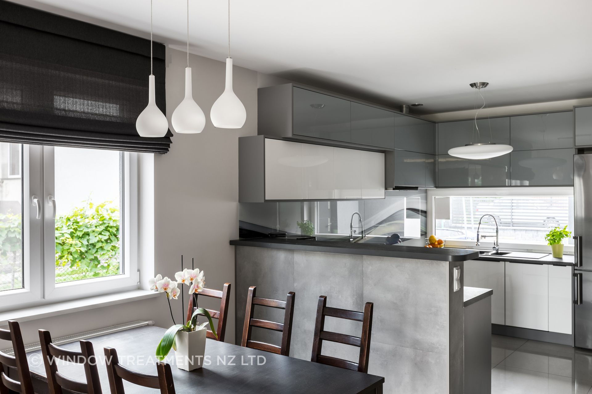 Roman blinds are effective insulators when fitted closely to the window frame.