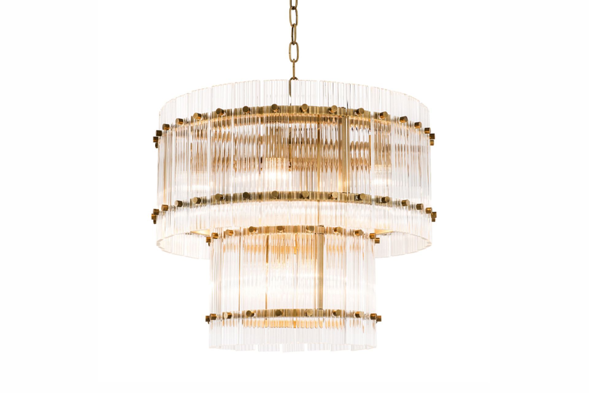 Fluted glass lighting like the Ruby chandelier from TRENZSEATER can add a stunning Art Deco-style feature in your interiors,
