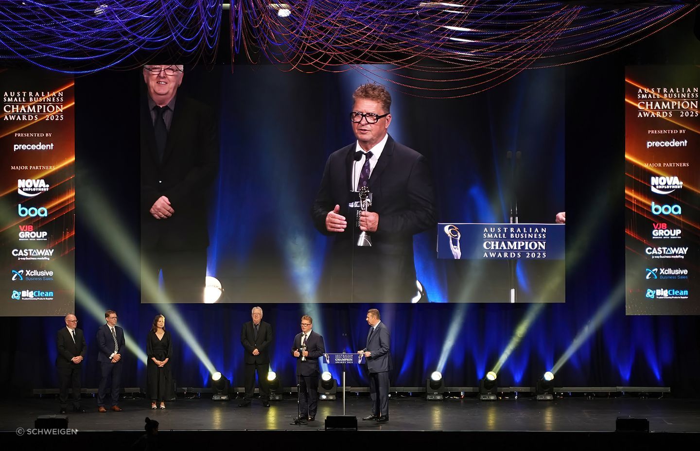 Schweigen Co-Owner, Anthony Fletcher, accepts the Specialised Retail Champion Award.