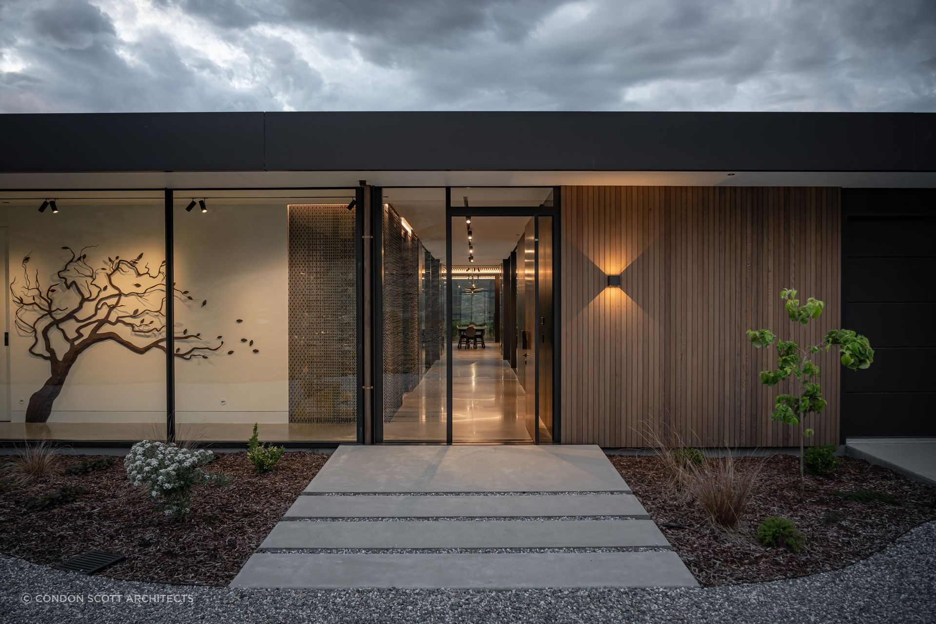 The front entrance to the house, positioned at the eastern pavilion. | Photographer: Simon Larkin