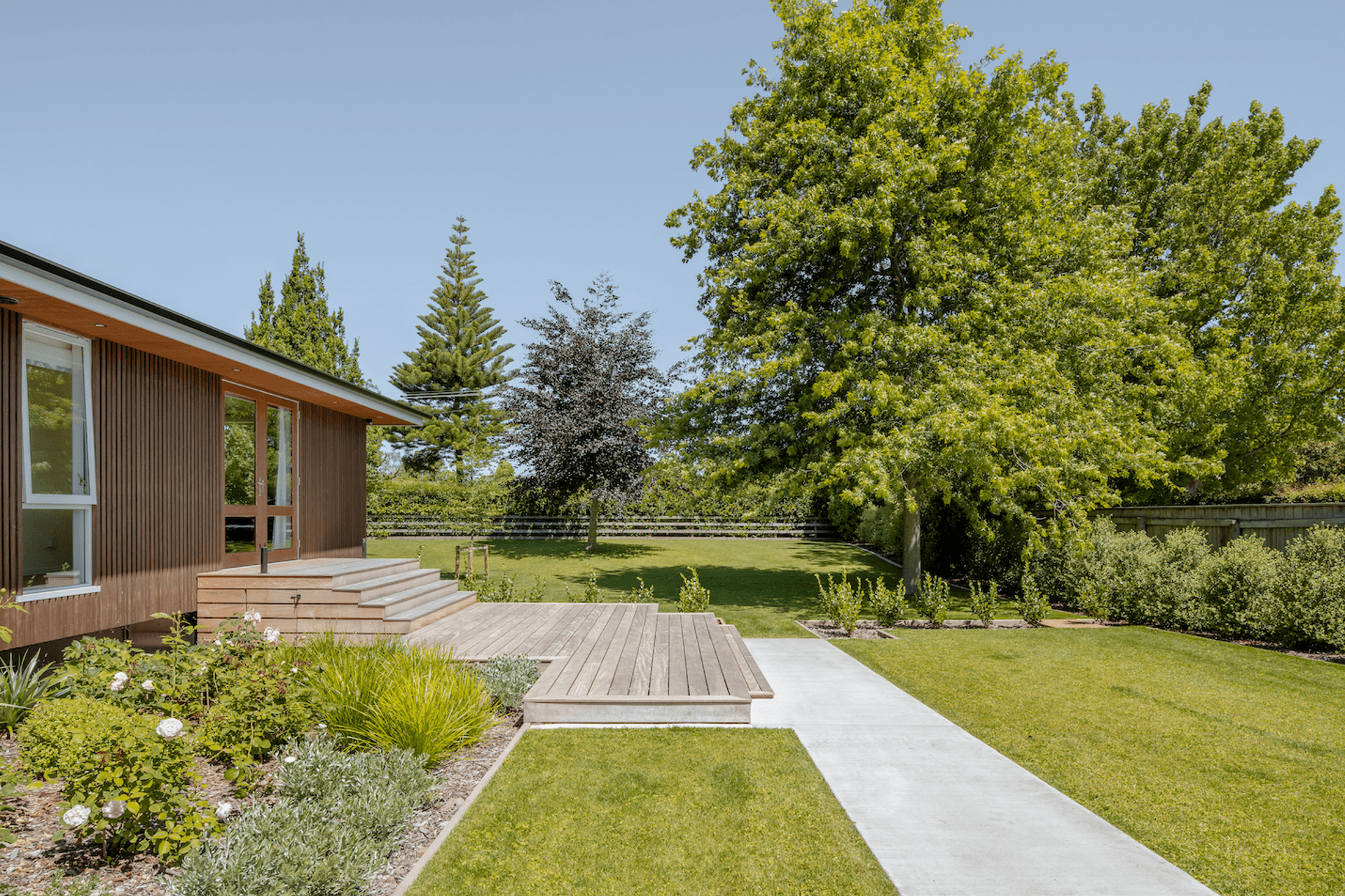 Work on the house concluded with landscaping.