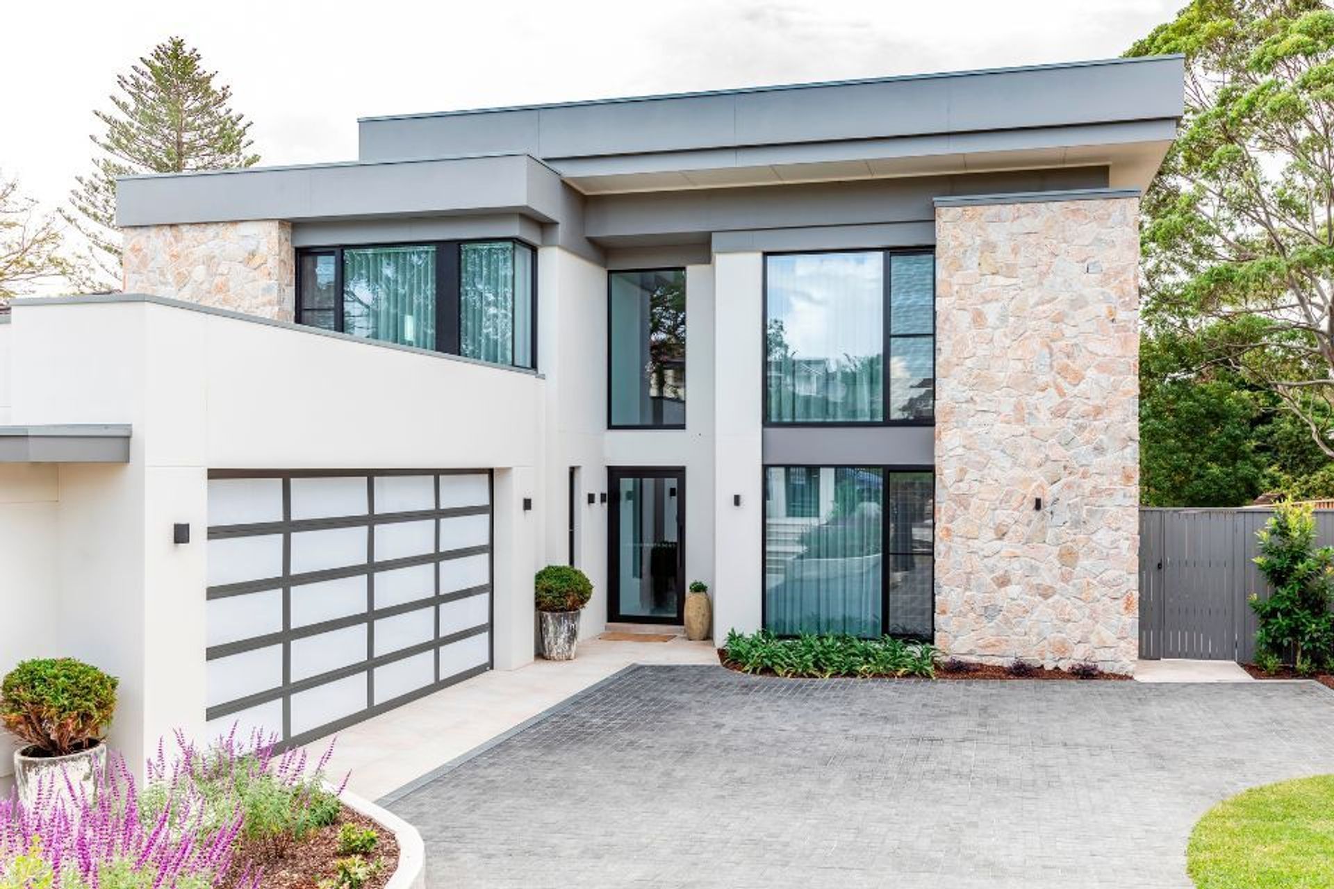 Summit Wall Cladding | Charcoal Cobblestones | Chateau Architects + Builders | Crystal Pools | Green Coast Landscapers | Think Outside Gardens | One Four Interiors