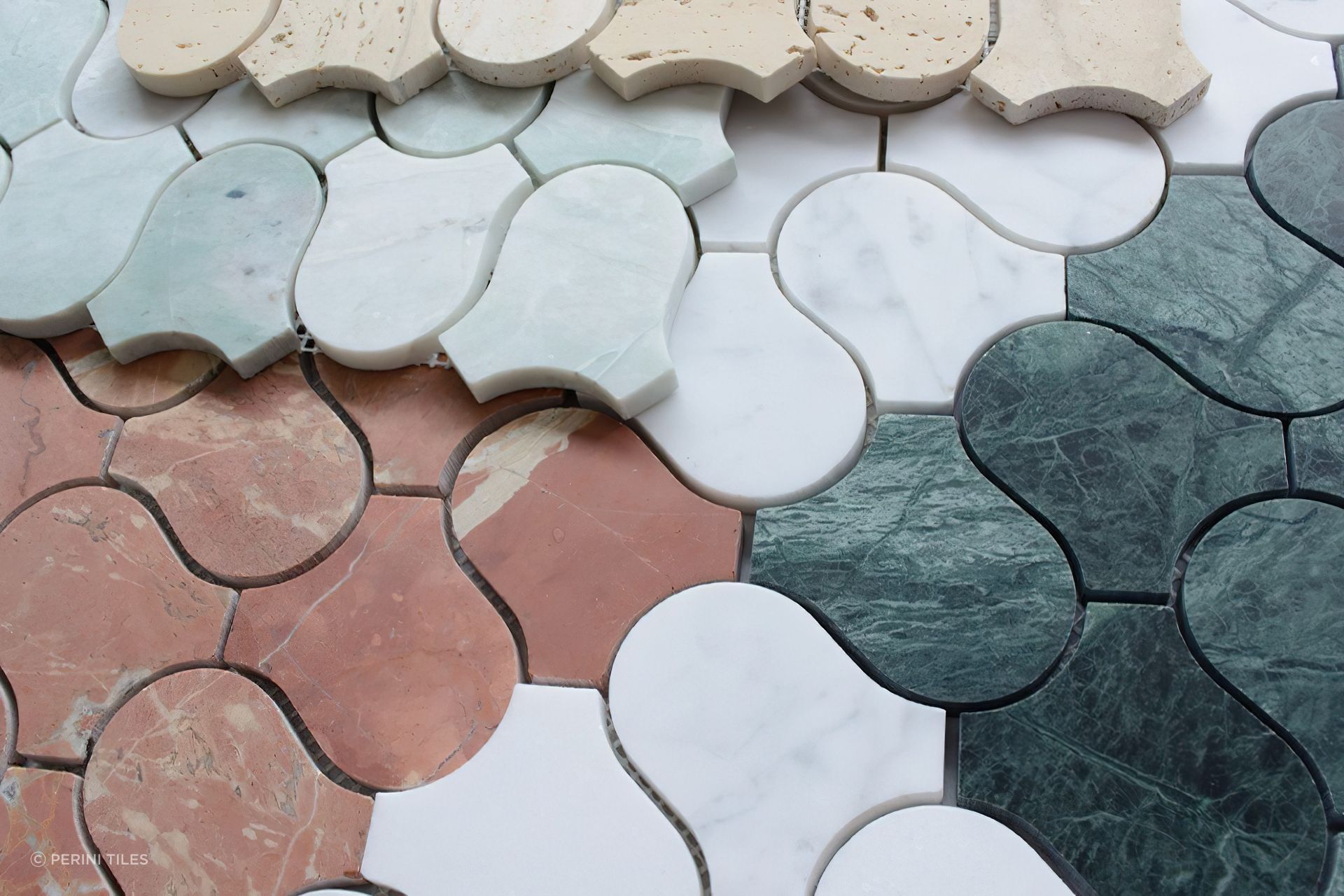 Featuring a lush honed finish, our Serpentine mosaic tile collection includes an endless variety of stone varieties including elegant Ming Marble, Indiana Viridi, Travertine and more.