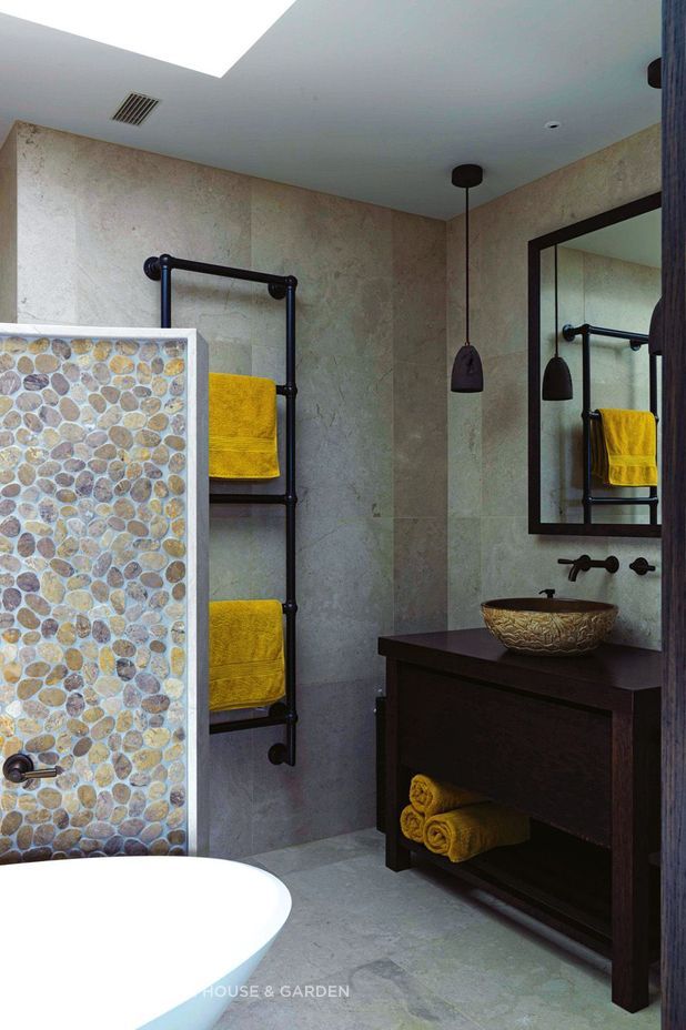 Hayley Dryland of August & Co designed the vanities in the main bedroom, the kitchen cabinetry and much of the other inbuilt furniture, all crafted by Hewe Architectural Cabinetry.