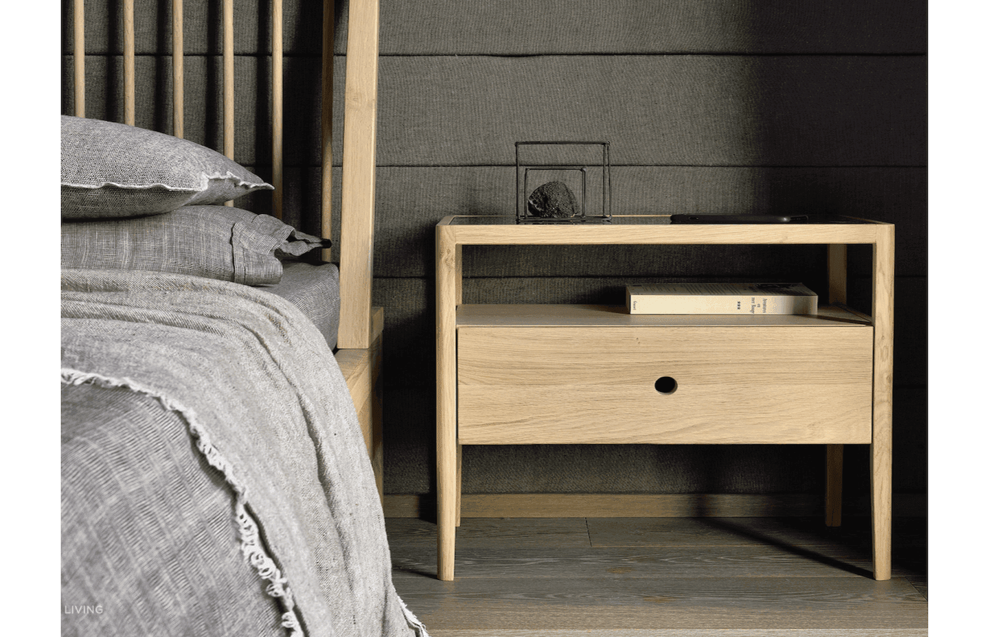 A bedside table with optimum bedside storage space can hold fun and practical household items. Featured product: Spindle Bedside Table.
