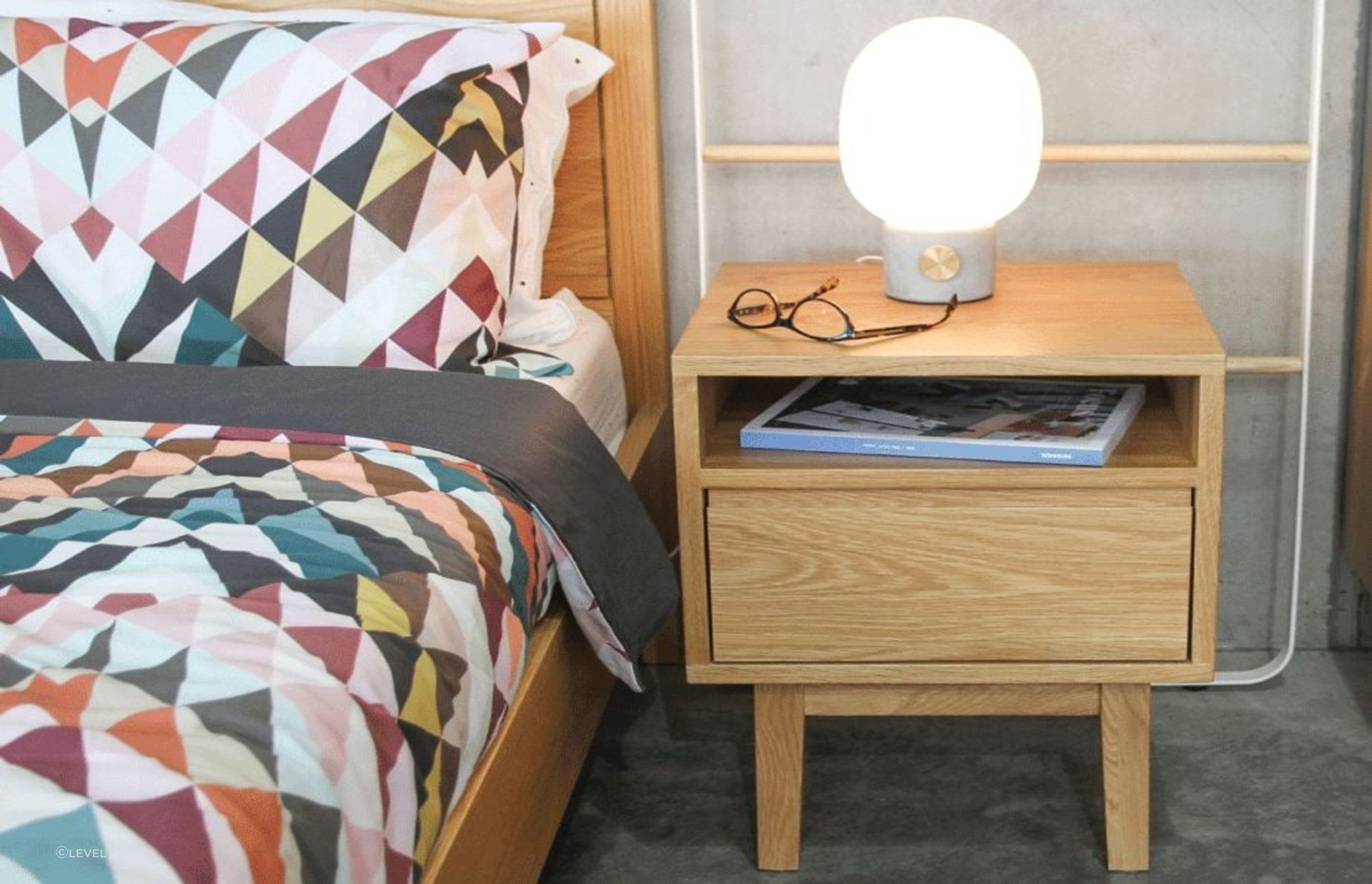 Store personal items such as your glasses and your evening read with ease. Featured product: Copenhagen Square Bedside Table.