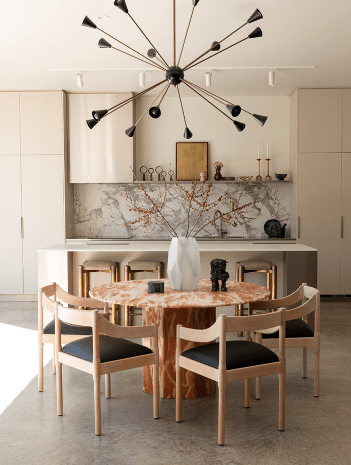 With an open floor plan and access to the courtyard, the kitchen and dining space is ideal for entertaining.