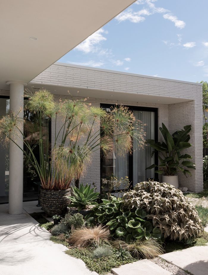 The media room sits at a right angle to the central living area.