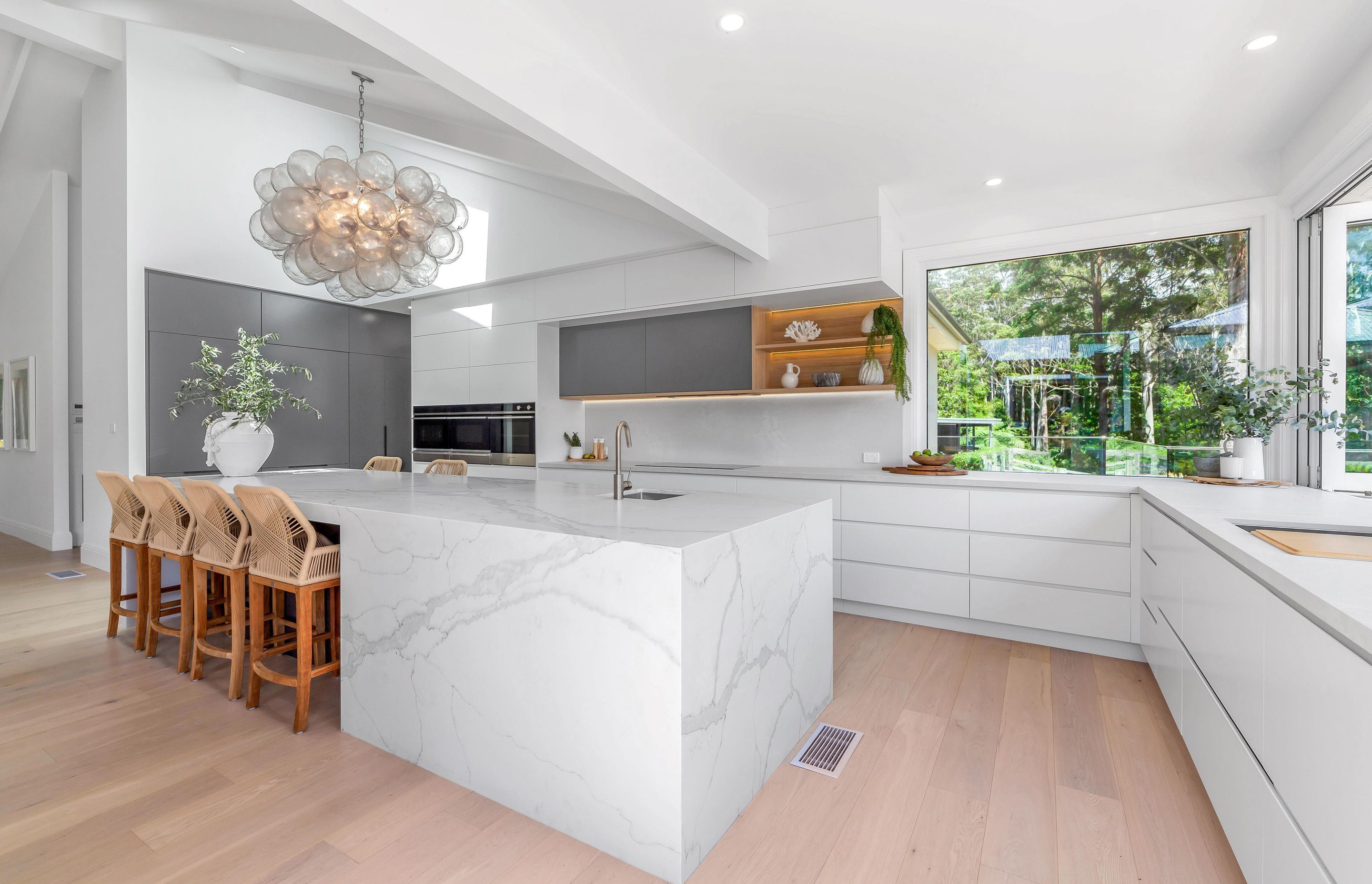 Designed by Vogue Kitchens, the Talostone Calacatta Luxe makes a hero of this 4.2m long island.