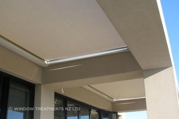 A Terrazza Awning can be installed in a pergola or above or below glass in a conservatory area.