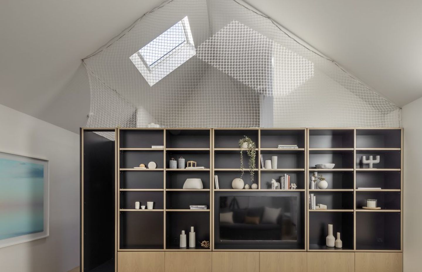 A secret stairway behind the cupboard leads to the loft. Image Murray Fredericks Photography
