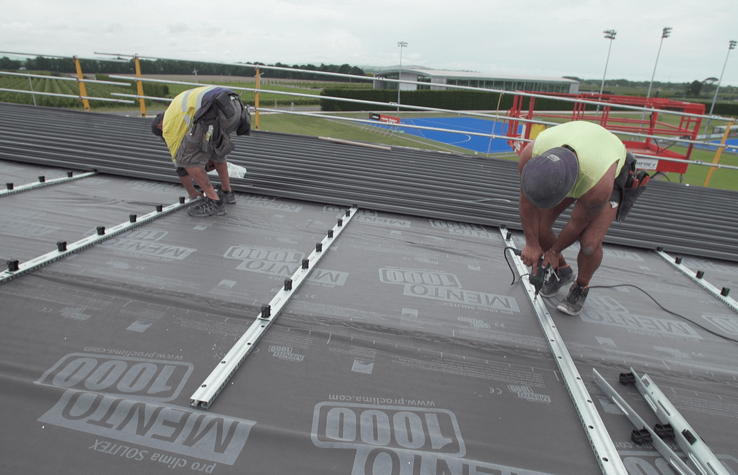 The Tricore Roofing System comprises a pre-finished lining sheet, perforated roof rail, underlay and top sheet.