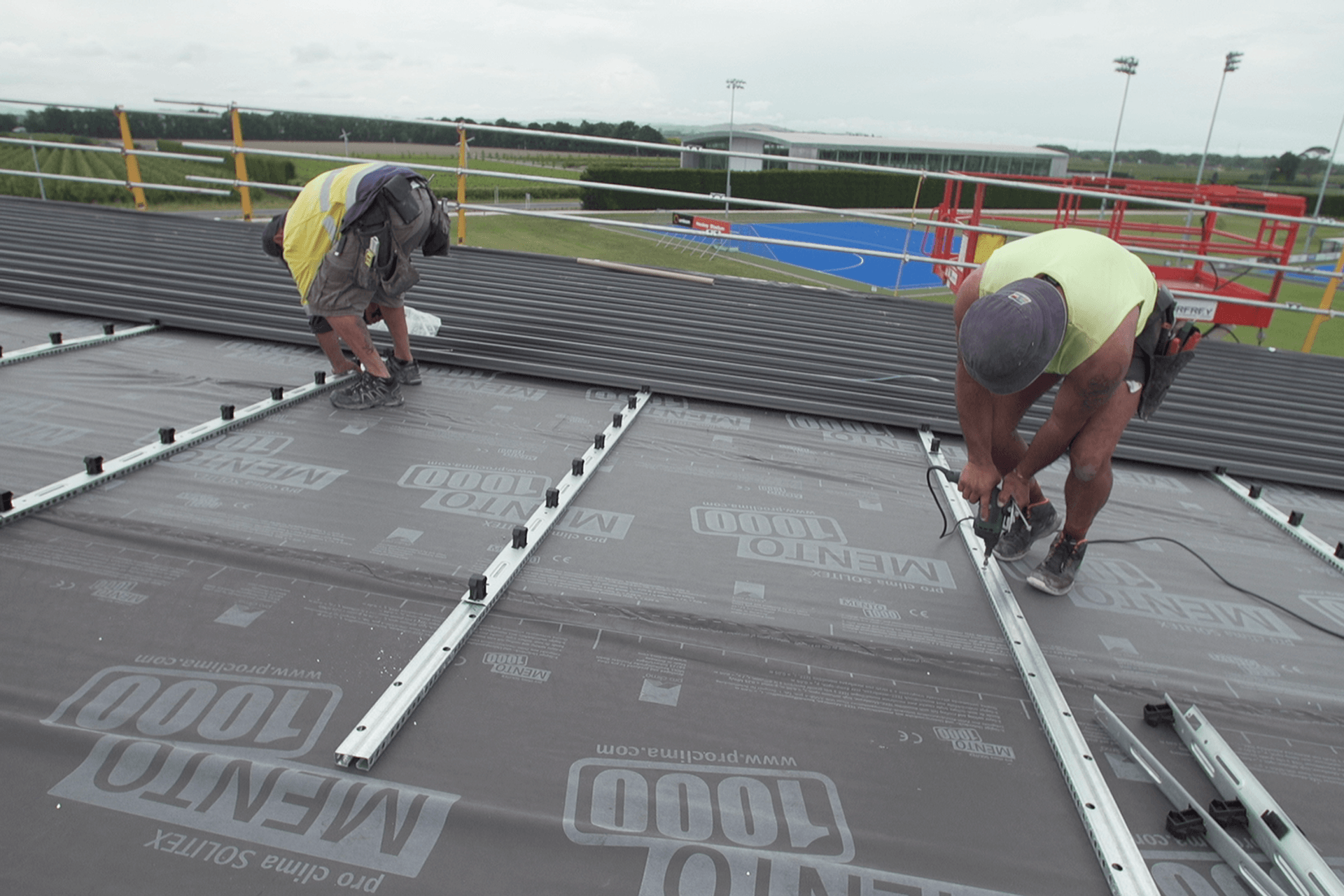 The Tricore Roofing System comprises a pre-finished lining sheet, perforated roof rail, underlay and top sheet.