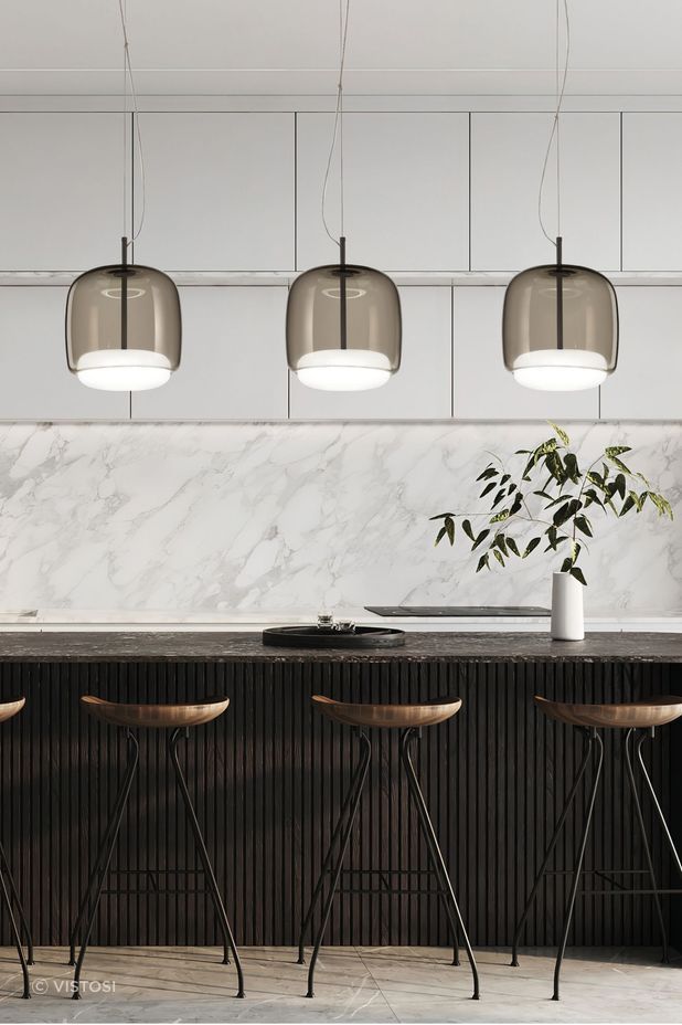 The Jube collection includes suspension, wall, table, and floor lamps, all with LED light sources