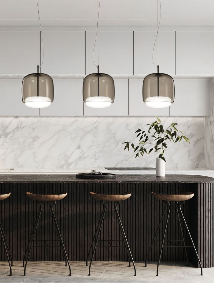 The Jube collection includes suspension, wall, table, and floor lamps, all with LED light sources