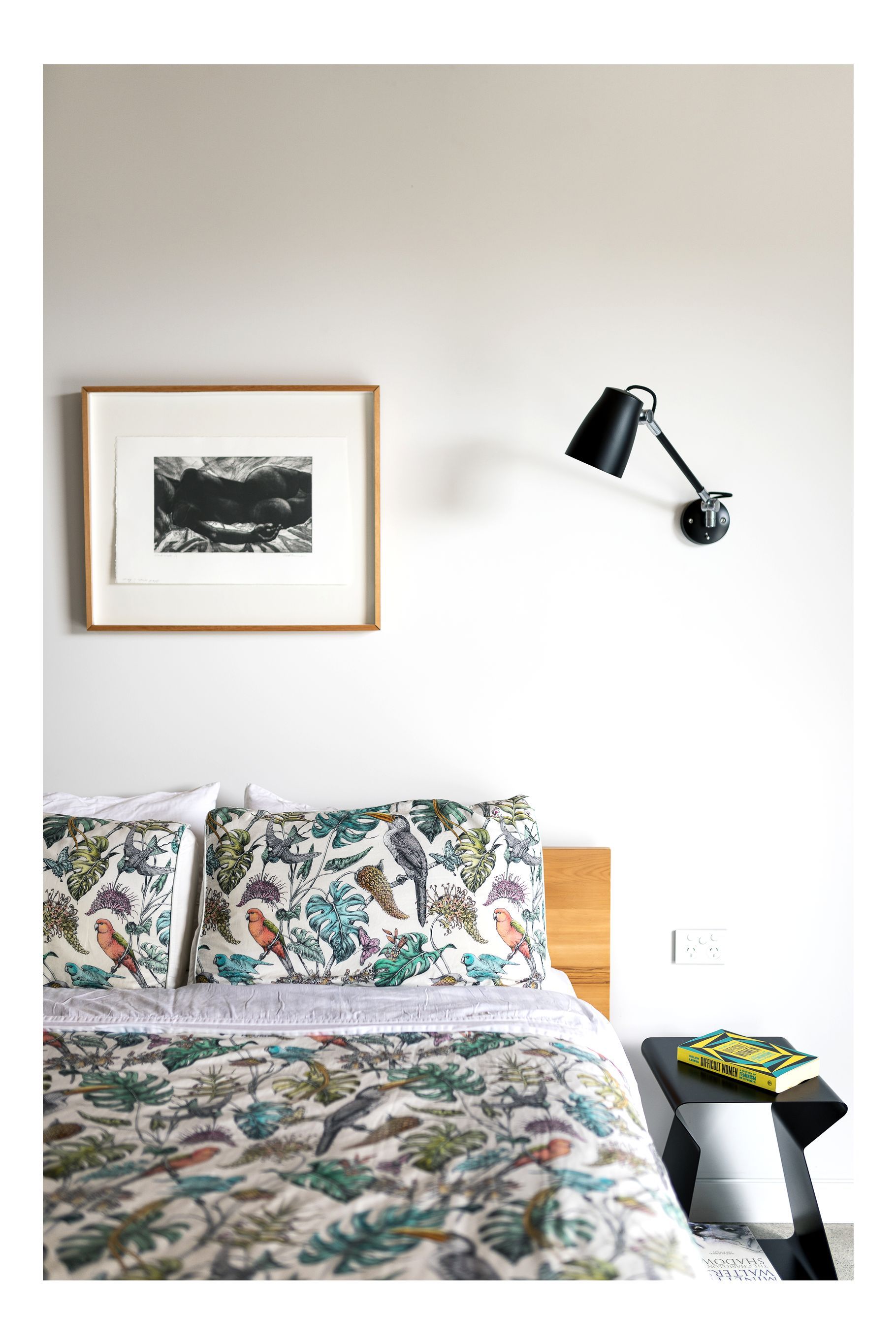 The house has four bedrooms, two bathrooms and a powder room. The walls are painted in Resene Snowdrift, which is offset by all steel being painted in Resene Nero.