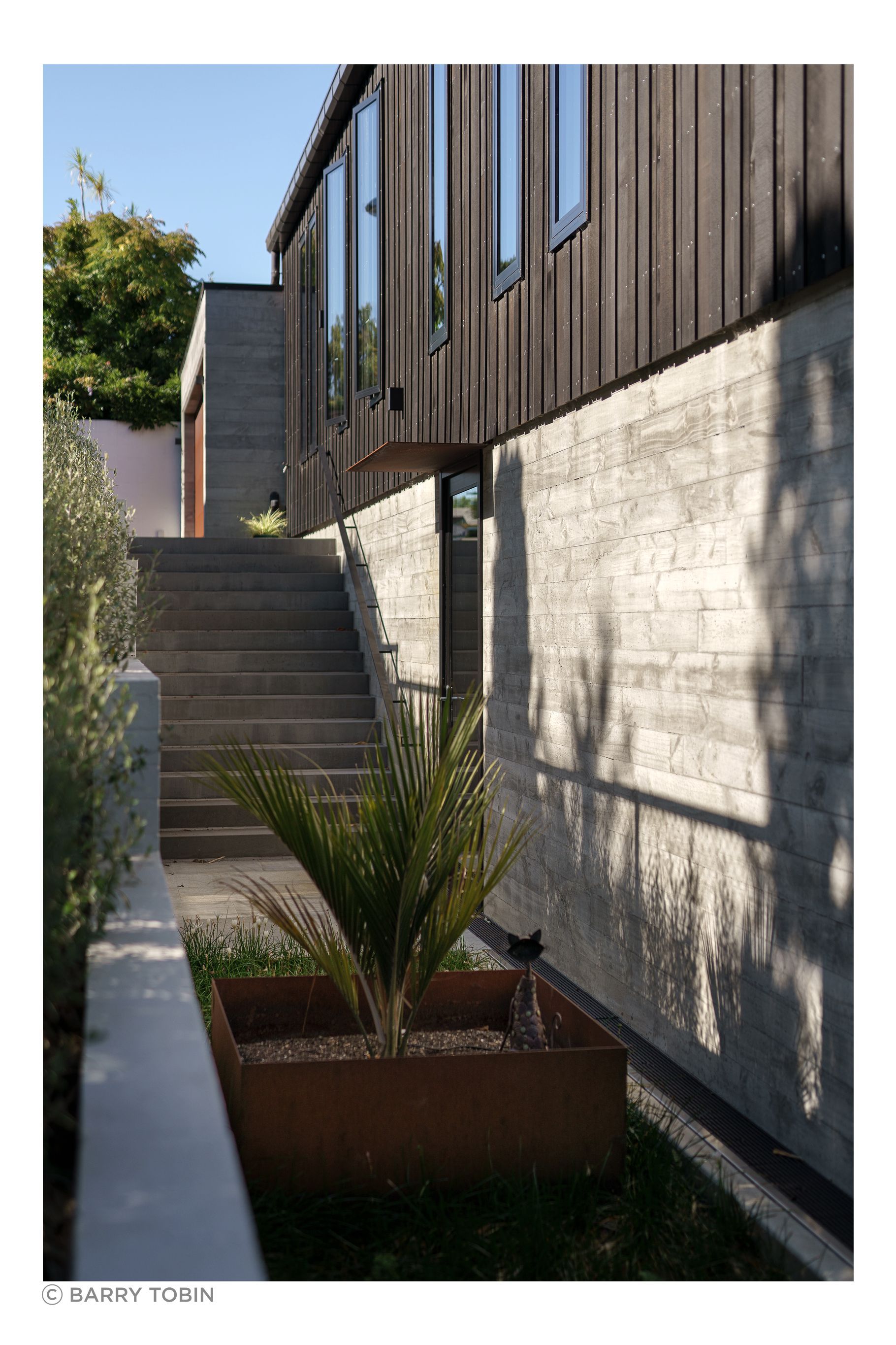 The house was positioned so a driveway could fit down the side, in case of future development of the large site.