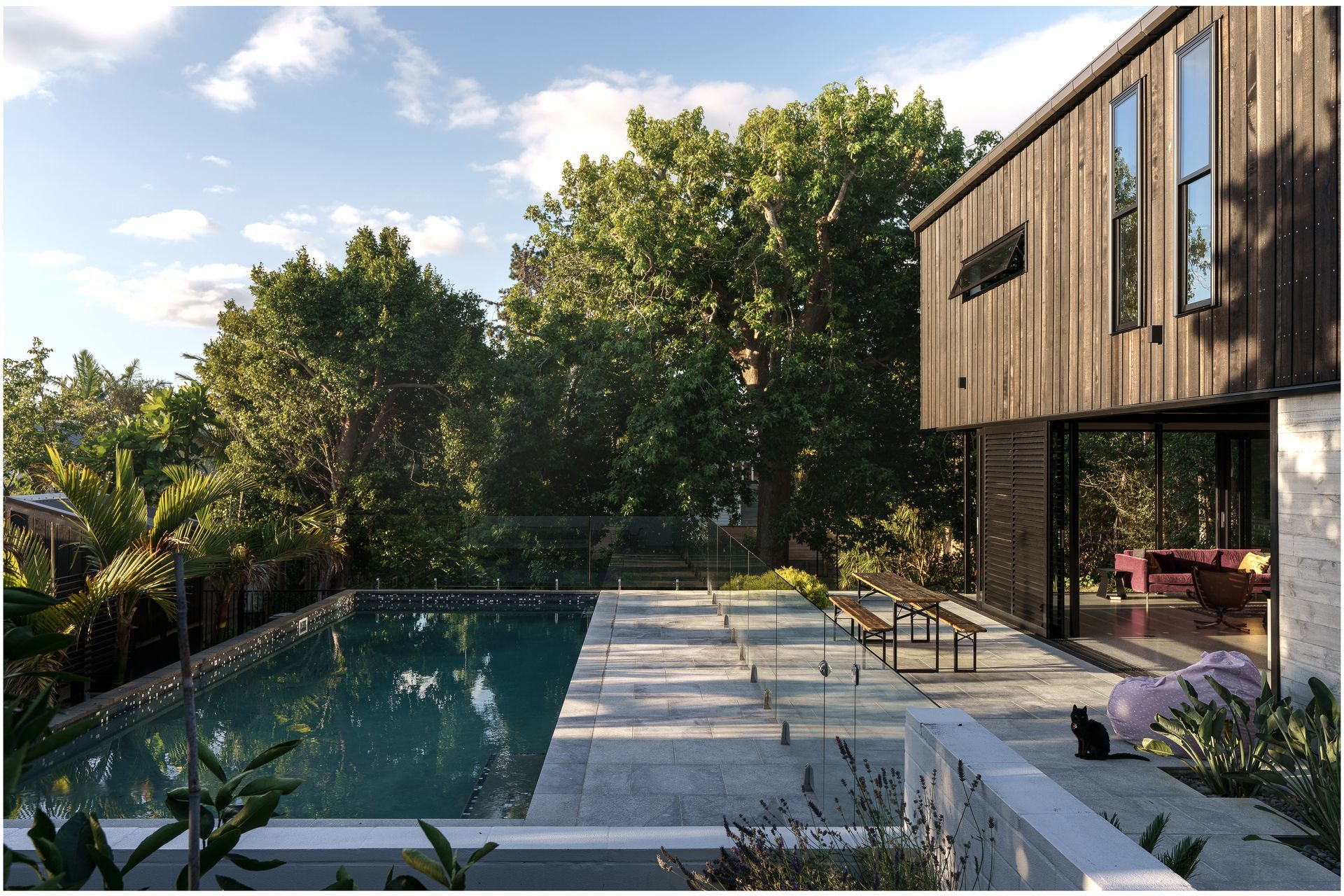 A large site means room for a pool. Landscape is also important and we designed around several existing mature trees, says Clive. “We have an arborist check all our trees on a regular basis, you have to when you get really big mature trees.”
