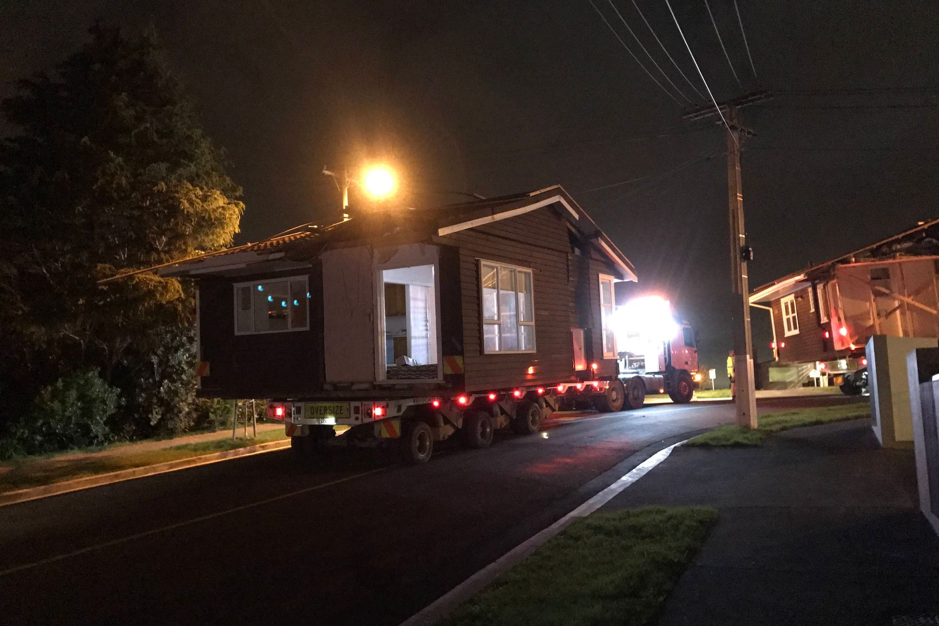 The existing house was transported to Hastings to be repurposed in a new development.