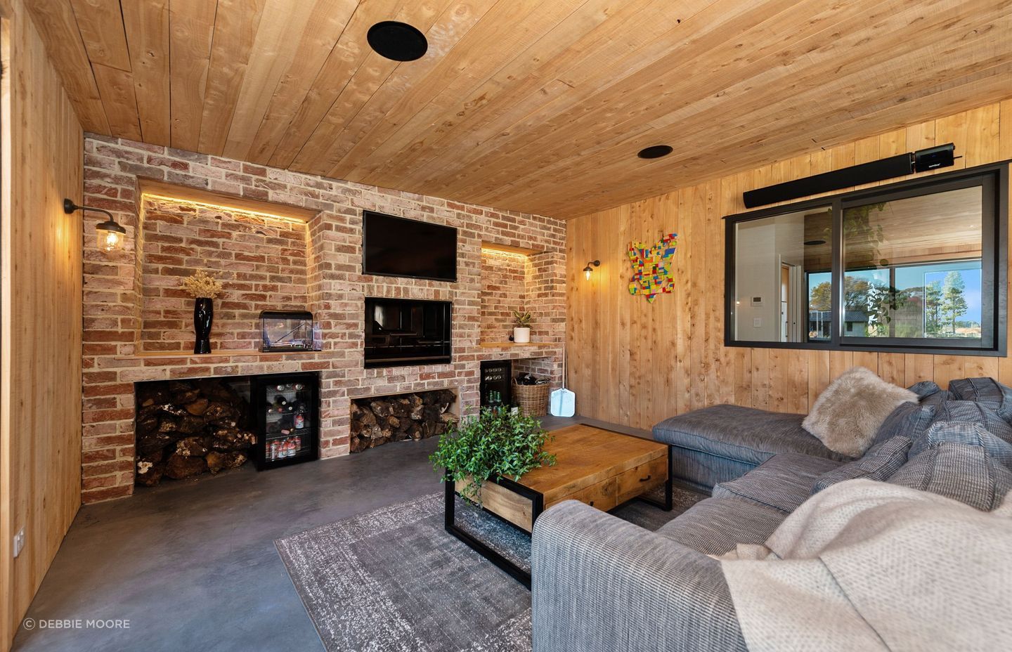 The outdoor fire is the Escea EK1250, which also incorporates cooking plates and grills.