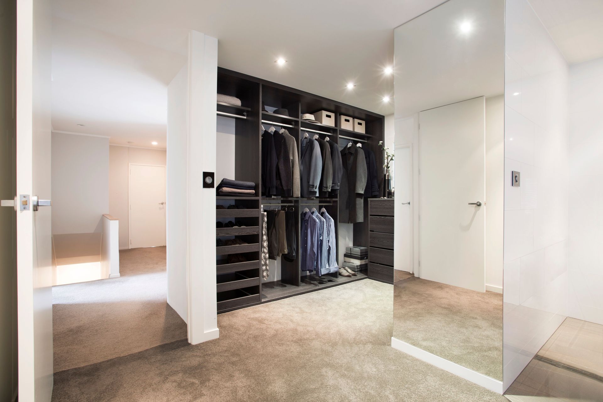 A place for everything and everything in it's place including coats, jackets, shirts, trousers, sweaters and shoes.