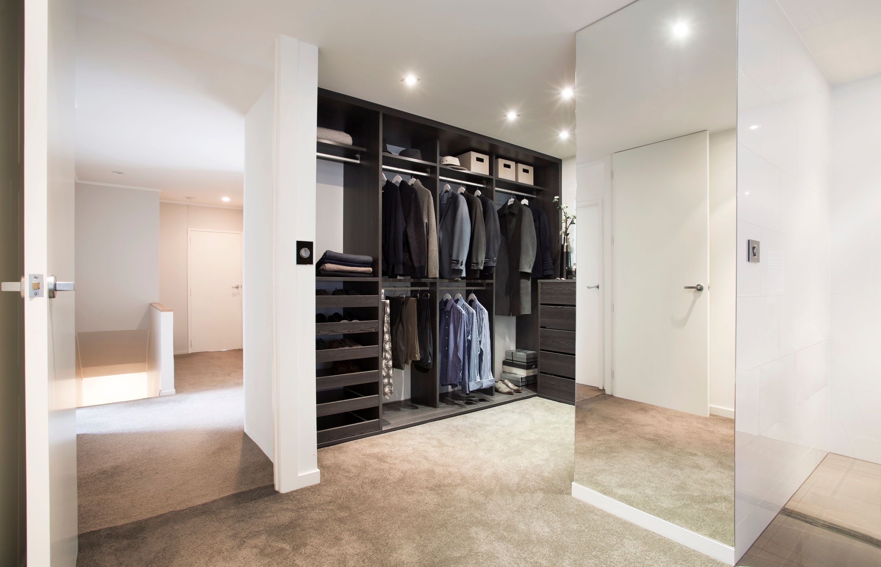 A place for everything and everything in it's place including coats, jackets, shirts, trousers, sweaters and shoes.