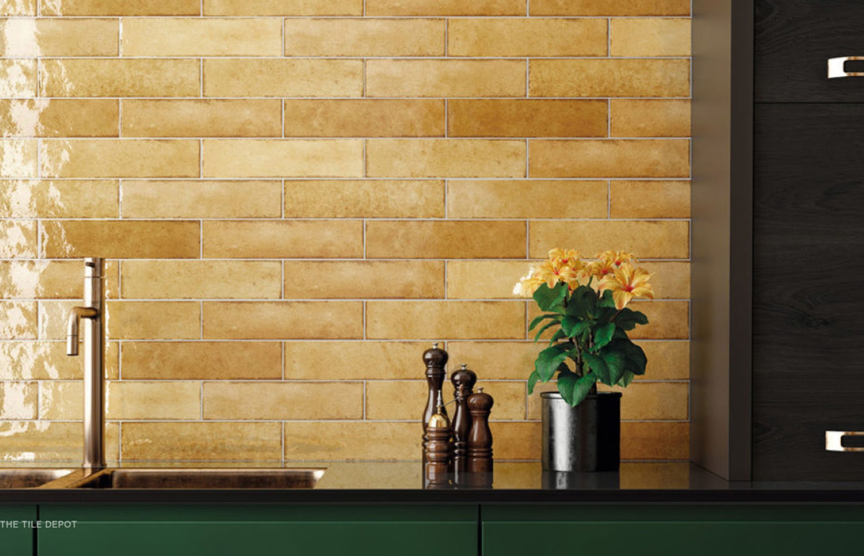 Warm yellow tiles are used in this kitchen as a splashback. These tiles are from the Tribeca collection at Tile Depot and this range comes with various warm coloured tiles. (Tile Depot 2021)