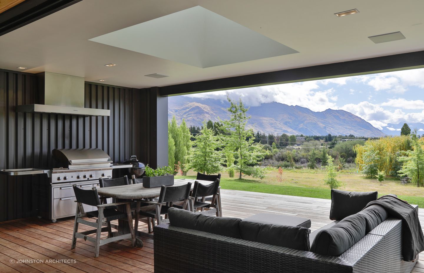 A sheltered outdoor living space with spectacular mountain views